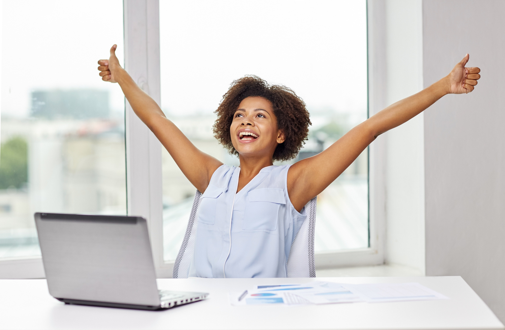 Happy African Woman with Laptop  